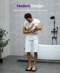 Man with cat on Digital Bathroom Scale With 450 Lb Capacity, 0.05 Lb Accuracy, Automatic Weighing For Body Weight, Babies And Pets