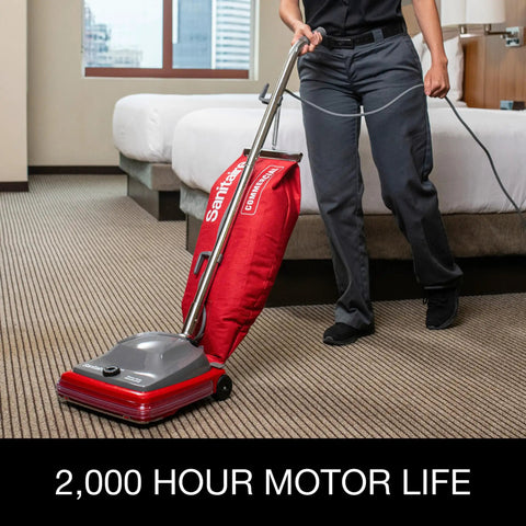 Hardcore Commercial Upright Bagged Vacuum Cleaner With Vibra Groomer Brush Roll, Fifty Foot Power Cord, Six Decked Out Height Settings, Beefy Long Life Motor, And Zero Hassle Shake Out Bags in use on low pile carpet.