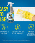 Hella Tough On Stubborn Mold And Mildew Stains Pack Of Two 32 Oz Bleach Free Spray Bottles on a cleaning surface with a sponge.