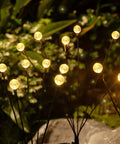 Solar Firefly Lights Outdoor Waterproof With Crystal Ball Swaying Design illuminating garden pathway at night