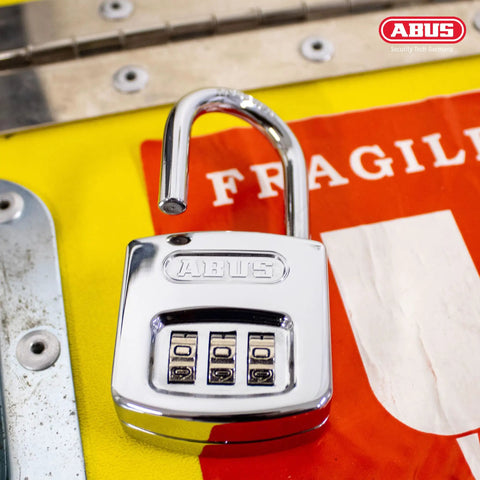 All Weather Chrome 3 Dial Combination Padlock With Resettable Lock Heavy Duty Hardened Steel Construction on fragile surface