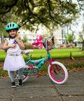 Barbie 16 Inch Girls Bike For Kids Aged Five To Seven With Fun Stylish Design Sturdy Durable Frame And Easy Assembly in park