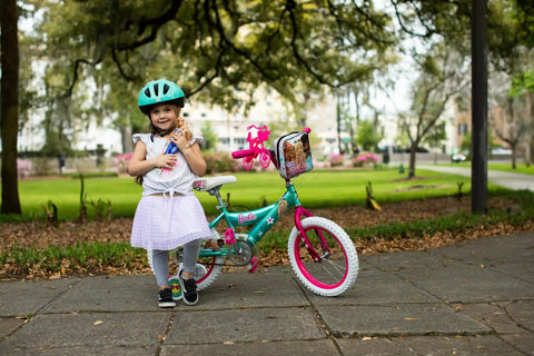 Barbie 16 Inch Girls Bike For Kids Aged Five To Seven With Fun Stylish Design Sturdy Durable Frame And Easy Assembly in park