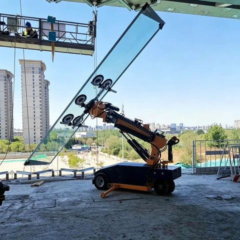 Hassle Free Heavy Duty Glass Vacuum Lifter Remote Control Architectural Window Handler lifting large glass panel at construction site.