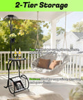 Must-Have Outdoor Solar Coffee Table With Light Black Iron 52.5 Inch Waterproof End Table For Living Rooms Or Patio Doubles As A Solar Floor Lamp And Plant Stand For Backyard Poolside Decor showcasing 2-tier storage on patio with swing chair