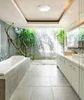 Bathroom with integrated LED light ceiling mount exhaust fan, white finish for removing humidity and odors, enhancing comfort.
