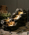 Epic 37 Inch Outdoor Floor Standing Five Tier Rock Waterfall Fountain With LED Lights For Patio Porch And Home Decor, garden setting