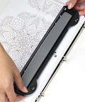 Person using On The Go 3 Hole Binder Punch For Ring Binders, Ultra Compact And Portable, Punches Up To Five Sheets At A Time With Easy Grip.