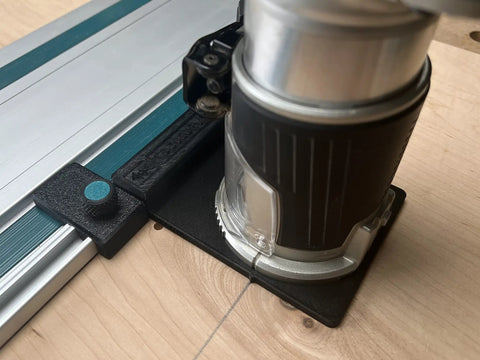 Killer Precision Router Guide Rail Adapter For Makita Tools shown mounted on track rail, detail of onboard rail stop.