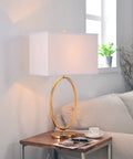 Oke Table Lamp With Gold Plated Finish, Modern Art Deco Open Round Frame, White Rectangular Shade on living room table