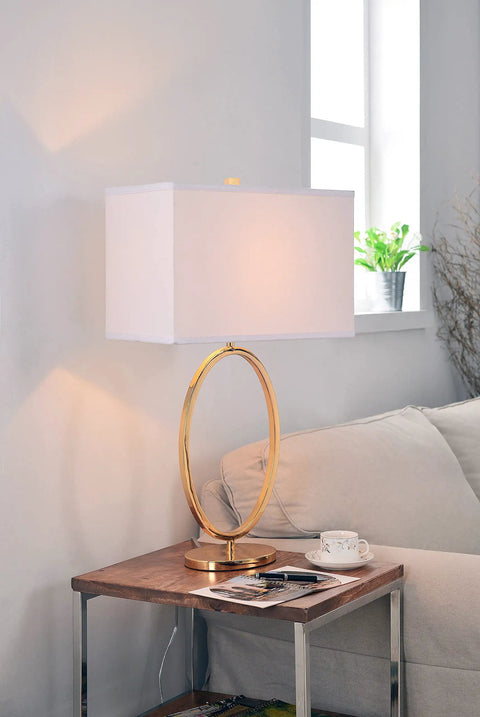 Oke Table Lamp With Gold Plated Finish, Modern Art Deco Open Round Frame, White Rectangular Shade on living room table