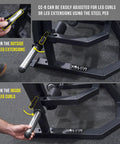 Adjustable steel peg on leg extension and curl machine for home or commercial gyms, plate loaded quad and hamstring trainer.