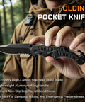 Close-up of a compact folding pocket knife with aluminum handle and stainless steel blade held in hand, perfect for camping and hiking.