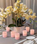 Pink Marble Real Wax Flameless Candles Votive Set With Gentle LED Flicker 2 Inch Wide By 2.2 Inch High 6 Pack on table setting