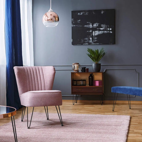 Room setup with pink chair, blue bench, cabinet, and table using 22 Inch Hairpin Leg Set For Coffee Tables Desks Nightstands And More Heavy Duty Satin Black Metal Two Rod Legs 3 Eighth Inch Dia Mid Century Modern Style DIY Ready For Rustic Industrial Projects.