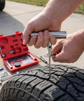 Using a T-handle tool from 68 Piece Heavy Duty Tire Repair Kit For Cars Motorcycles Trucks ATVs SUVs RVs Trailers With Patches And Plug Tool Set Universal Flat Tire Patch Kit For Quick On The Go Tire Fixes on tire