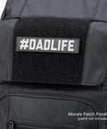 Close-up of Everyday Tactical Diaper Bag Backpack For Dads with morale patch panel detail and black material texture.