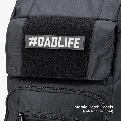 Close-up of Everyday Tactical Diaper Bag Backpack For Dads with morale patch panel detail and black material texture.
