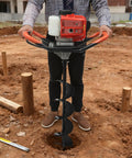 Gas Powered Post Hole Digger With 2.3HP Engine Earth Auger Kit drilling hole in dirt with anti-vibration handle