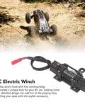 Premium Alloy RC Winch With Dual Motor For Axial Scx10 And D90 1/10 Crawlers displayed next to rugged terrain.