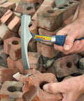 Bricklayer And Mason Hammer 16 Oz USA Made Built Tough Pro Grade Masonry Tool With Forged Steel Construction in use on bricks