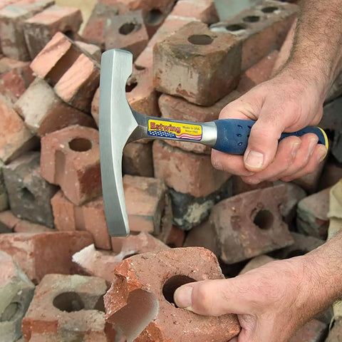 Bricklayer And Mason Hammer 16 Oz USA Made Built Tough Pro Grade Masonry Tool With Forged Steel Construction in use on bricks