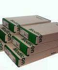 Stacked boxes of Quantum PLC Output Module 140 DRC 830 00 Sealed New for shop floor 8x1 NO NC Relay Modicon Schneider