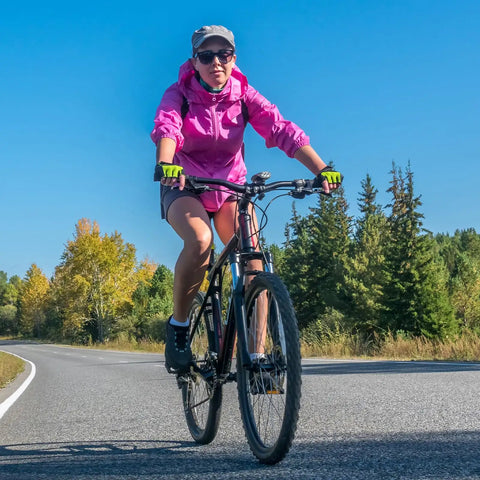 Cyclist on road bike using Heavy Duty 26 Inch Bike Inner Tubes 26x1.50/1.75/1.90 with 32mm Schrader Valve, Two Pack