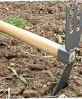 All Purpose Garden Hoe And 2-In-1 Digging Fork With Wooden Handle, Carbon Steel Head in soil for weeding and digging