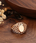 Fresh Rose Gold Oval Mesh Statement Ring For Women Featuring Sleek Polished Surface and Dope Openwork Grid Band on wooden surface.