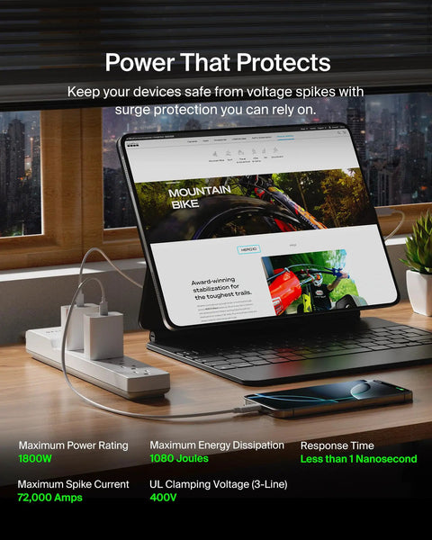 6 Outlet Surge Protector Power Strip Featuring A 360 Degree Rotating Plug And 6 Foot Cord on a desk with devices showing safety specifications.