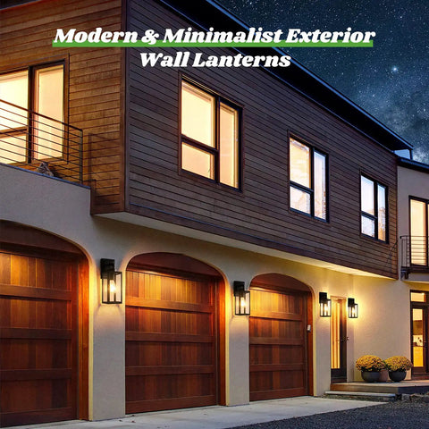 2 Pack Outdoor Wall Light Fixtures Exterior Waterproof Anti Rust Glass Shades Matte Black Porch Sconces For Patio Front Door Garage Wall Mounted Lighting E26 Modern Sconces Built Tough No Fuss Easy Install illuminating a modern house exterior at night.