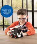 Child playing with Bobcat 1/16 Scale Skid Steer Loader Diecast Toy With Fully Functional Front Loader And Tilt Bucket Realistic Bobcat Graphics