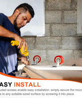 Person using drill to install Eight Pack 1 Inch Caster Wheels With 360 Degree Swivel Plate Castors for furniture and bins.