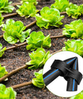 Garden with green plants and a Durable 26 Piece Irrigation Fittings Kit For One Half Inch Tubing With Eight Couplings