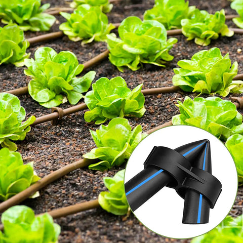 Garden with green plants and a Durable 26 Piece Irrigation Fittings Kit For One Half Inch Tubing With Eight Couplings