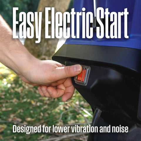 Hand pressing start button on corded electric wood chipper shredder Be The Yard Boss with 1.7 inch capacity and 15 amp motor