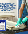 Man using Industrial-Grade Acetone Solvent for Cleaning, Stripping and Thinning on a wooden frame, wearing gloves, can visible.