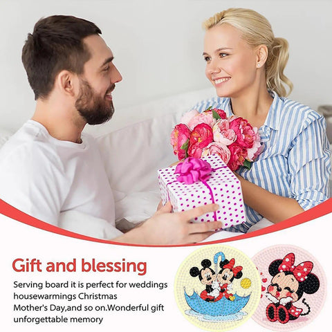 Couple exchanging gifts with cartoon diamond painting coasters featuring Mickey and Minnie Mouse shown below.