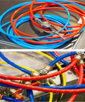 Heavy Duty Flexible Compressor Air Hose, Built Tough Pneumatic Tubing, 328 Foot Polyurethane Line with colorful connectors on machinery.