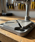 Close-up of the sturdy base of Heavy Duty Aluminum Drill Press Stand For Hand Drills, built for stability in woodworking.