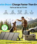 Man feeding dog beside Beast Mode Elite 100 V2 Portable Power Station 1024Wh LFP Battery Backup in a scenic outdoor setting.
