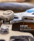 Slim Jaw Adjustable Wrench 8 Inch with Extra Wide Mouth gripping bolt in tight spot, showing Code Blue finish in use for repairs.