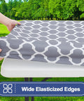 Wide elasticized edges on grey waterproof picnic table cover for 72 inch tables, outdoor setting