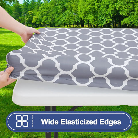 Wide elasticized edges on grey waterproof picnic table cover for 72 inch tables, outdoor setting