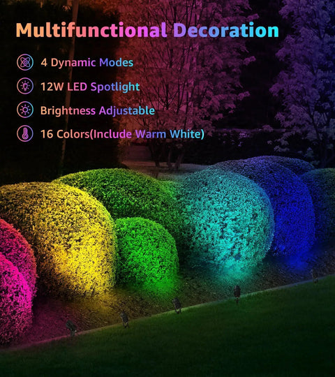 Two Pack Outdoor RGBW LED Spotlight Kit With Remote Control illuminating garden bushes in 16 colors showing dimmable feature.