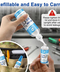 Hand using Silicone Airsoft Lubricant With Needle Oiler 6 oz Chamber Lube For Airguns on a small bottle, pouch storage view.