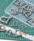 Kickass 304 Stainless Steel D Shape Shackles With Secure Screw Pin 3 8 Inch Heavy Duty Rigging Hardware arrangement with measuring tape.