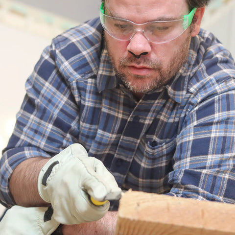 Man wearing Dust Blocker Nose Filter Mask for Nose Personal Protective Disposable Dust Mask, working on woodworking task