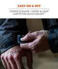 Close-up of hands adjusting cuffs on N-Ferno 6467 Winter Work Jacket With Thermal Insulation And Removable Hood For Extreme Cold.
